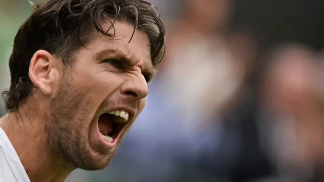 Cameron Norrie reacts