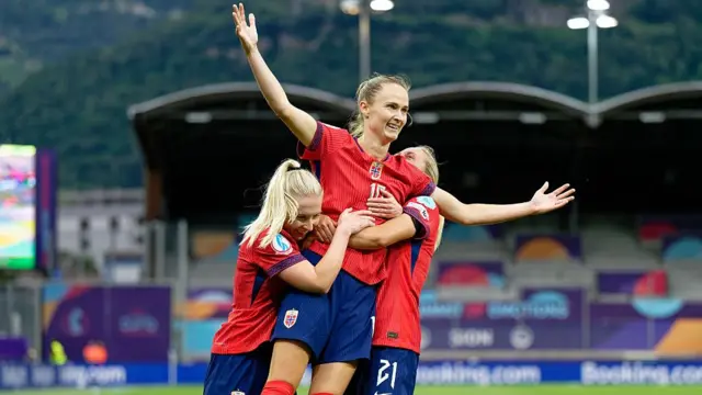 Caroline Graham Hansen of Norway celebrates after scoring her team's second goal with teammates Lisa Naalsund of Norway and Thea Bjelde of Norway during the UEFA Womens EURO 2025 Group A match between Norway and Finland at Stade de Tourbillon