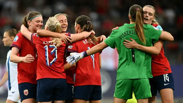 Norway's forward #22 Signe Gaupset, Norway's midfielder #21 Lisa Naalsund and Norway's defender #16 Mathilde Harviken celebrate at the end of the UEFA Women's Euro 2025 Group A football match between Norway and Finland at the Stade de Tourbillon in Sion