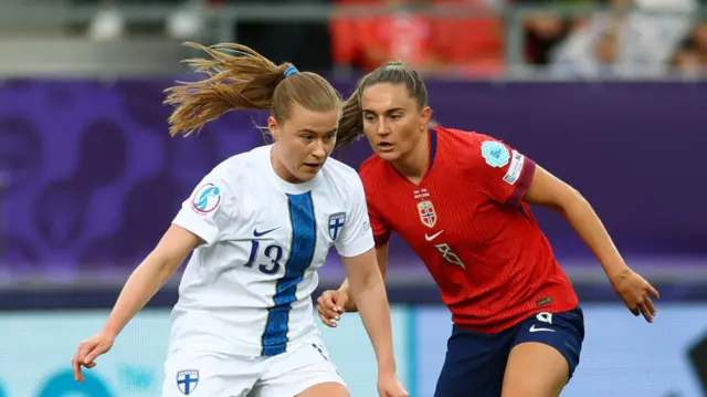 Finland's Oona Siren in action with Norway's Vilde Boe Risa