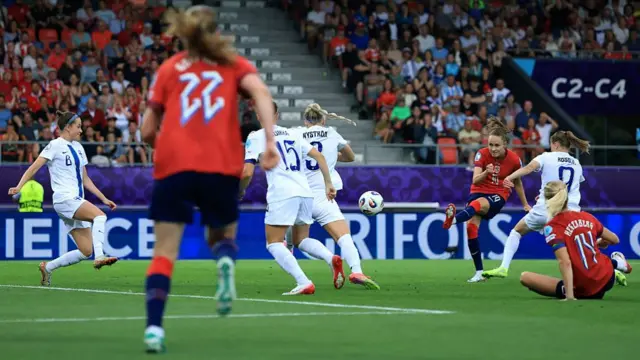 Caroline Graham Hansen of Norway shoots under pressure from Katariina Kosola of Finland during the UEFA Women's EURO 2025 Group A match between Norway and Finland at Stade de Tourbillon