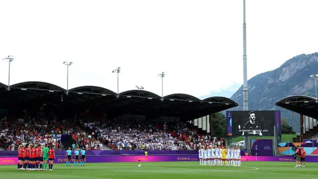 The LED screen displays a tribute to Diogo Jota, as Players of Norway and Finland pause for a moments silence in memory of former football player Diogo Jota and his brother Andre Silva, who passed away on the 3rd of July 2025, prior to the UEFA Women's EURO 2025 Group A match between Norway and Finland at Stade de Tourbillon