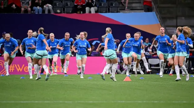 Iceland players warm-up prior to the start of the UEFA Women's Euro 2025 Group A football match between Switzerland and Iceland at the Wankdorf stadium in Bern