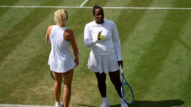 Taylor Townsend of United States speaks with Katerina Siniakova of Czechia
