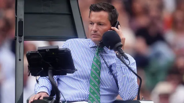 Umpire on phone