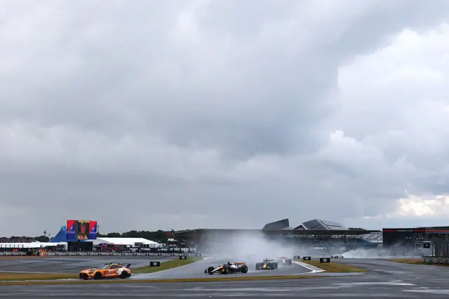 Oscar Piastri and Max Verstappen behind the safety car at the british Grand Prix