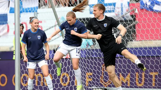 Oona Siren of Finland warms with with a member of the coaching staff prior to the UEFA Women's EURO 2025 Group A match between Norway and Finland at Stade de Tourbillon