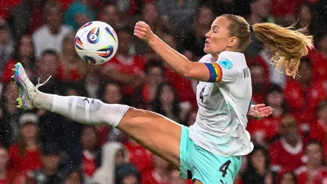 celand's defender #04 Glodis Viggosdottir kicks the ball during the UEFA Women's Euro 2025 Group A football match between Switzerland and Iceland at the Wankdorf stadium in Bern