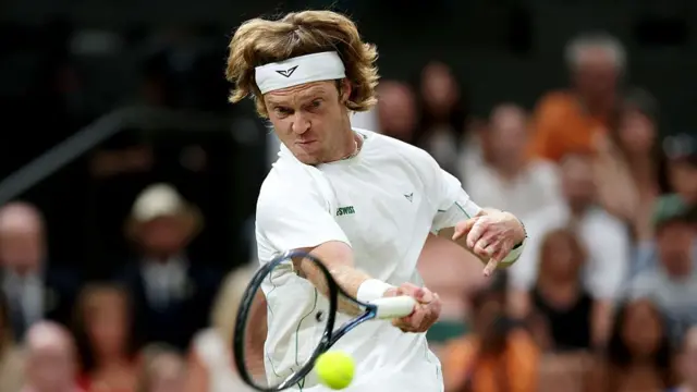 Andrey Rublev plays a forehand