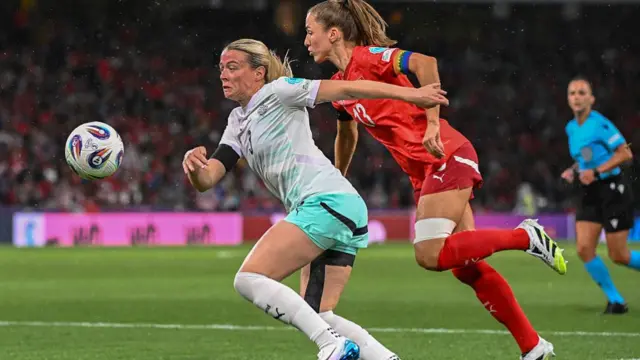 Iceland's forward #03 Sandra Jessen and Switzerland's midfielder #13 Lia Walti fight for the ball during the UEFA Women's Euro 2025 Group A football match between Switzerland and Iceland at the Wankdorf stadium in Bern,