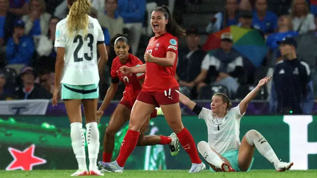 Svenja Foelmli of Switzerland celebrates after Glodis Viggosdottir of Iceland (not pictured) scores a own goal which was later ruled out following a VAR due to a foul in the build up