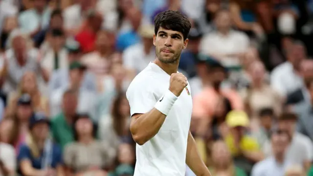 Carlos Alcaraz of Spain celebrates a point