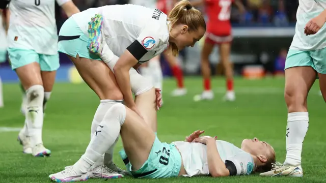 Iceland's Gudny Arnadottir reacts after sustaining an injury