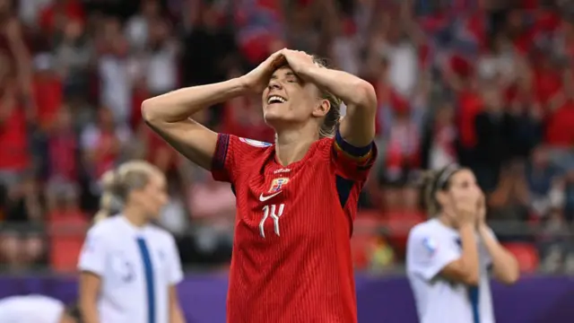 Norway's forward #14 Ada Hegerberg celebrates a goal by Norway's forward #10 Caroline Graham during the UEFA Women's Euro 2025 Group A football match between Norway and Finland at the Stade de Tourbillon in Sion
