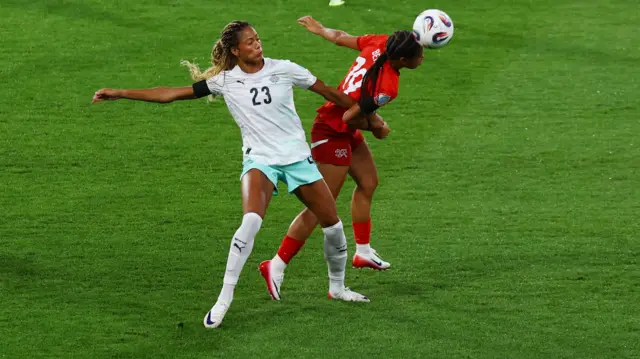 Switzerland's Iman Beney in action with Iceland's Sveindis Jonsdottir