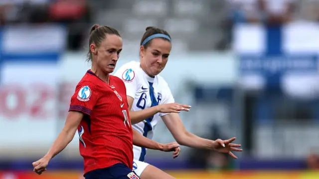 Caroline Graham Hansen of Norway battles for possession with Joanna Tynnila of Finland during the UEFA Women's EURO 2025 Group A match between Norway and Finland at Stade de Tourbillon