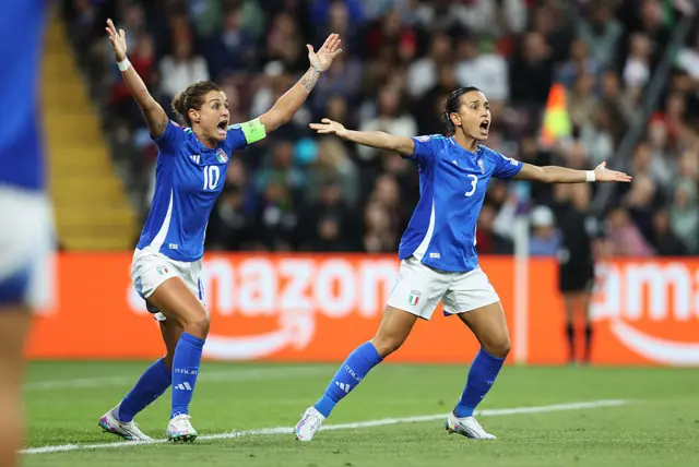Cristiana Girelli and Lucia Di Guglielmo of Italy react to a refereeing decision during the UEFA Women's EURO 2025 Group B match between Portugal and Italy at Stade de Geneve on July 07, 2025 in Geneva, Switzerland. (