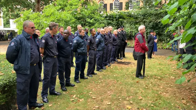 Emergency personnel line up in Tavistock Square