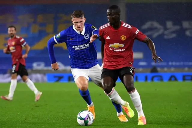 Viktor Gyokeres chasing Eric Bailey on the ball