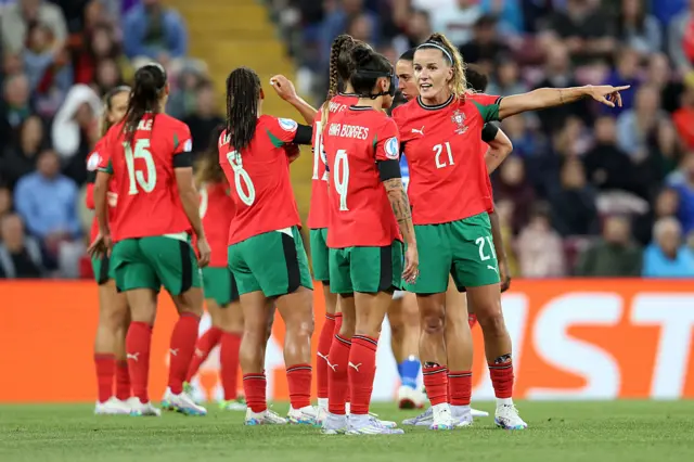 Ana Capeta of Portugal interacts with teammates Diana Gomes and Ana Borges during the UEFA Women's EURO 2025 Group B match between Portugal and Italy at Stade de Geneve on July 07, 2025 in Geneva, Switzerland.