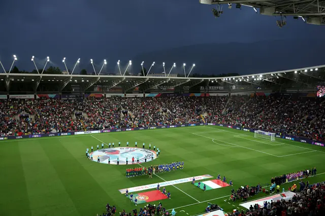 A general view inside the stadium as the match officials and players of Portugal and Italy line up prior to kick-off ahead of the UEFA Women's EURO 2025 Group B match between Portugal and Italy at Stade de Geneve on July 07, 2025 in Geneva, Switzerland.