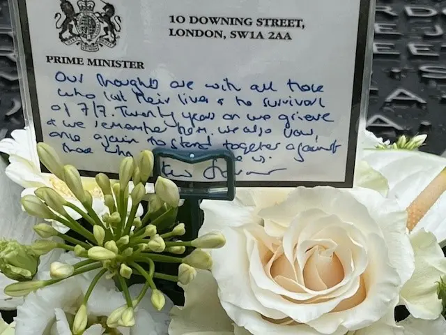 PM's message attached to wreath