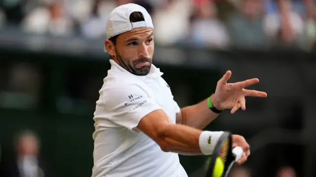 Grigor Dimitrov hits a forehand