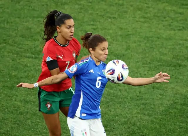 Italy's Manuela Giugliano in action with Portugal's Francisca Nazareth