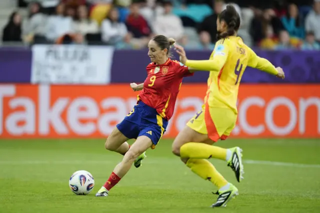Spain's Esther Gonzalez (left) scores their side's third goal