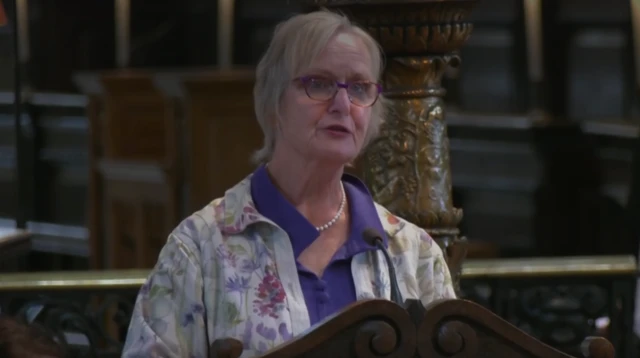 Woman does a reading at the 7/7 memorial service at St Paul's Cathedral