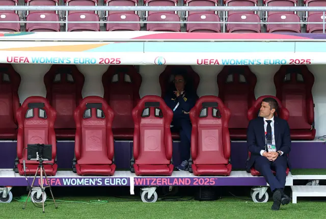 Portugal manager Francisco Neto sits on the bench