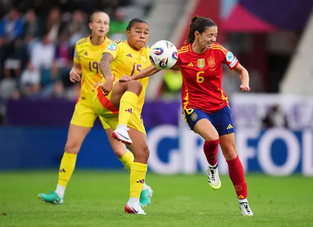 Mariam Toloba of Belgium and Aitana Bonmati of Spain compete for the ball
