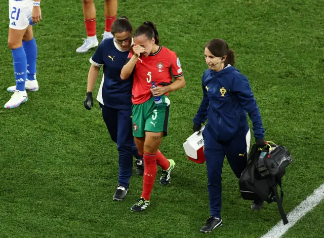 Portugal's Joana Marchao reacts as she is substituted after sustaining an injury