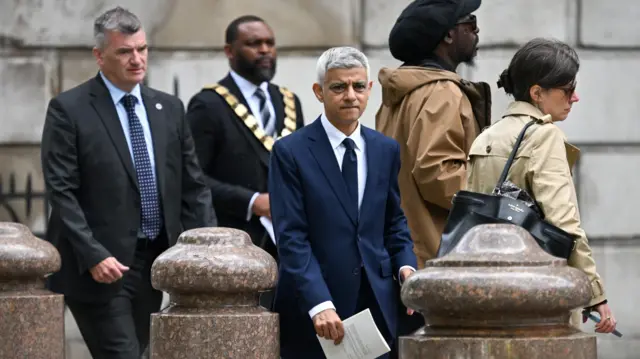 Mayor of London Sadiq Khan walks outside St Paul's Cathedral