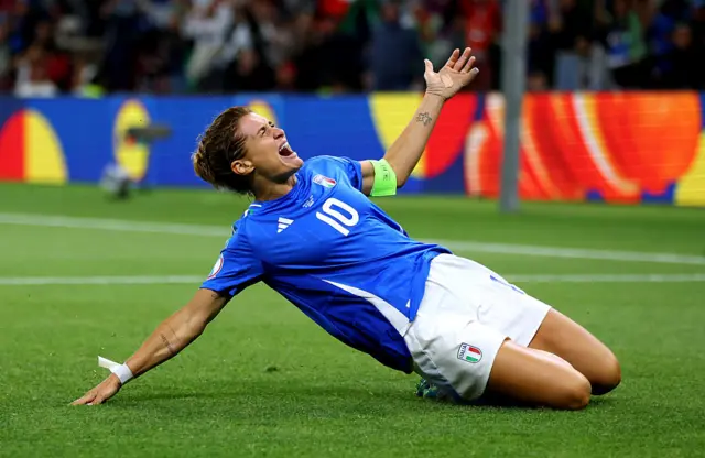 Cristiana Girelli of Italy celebrates scoring her team's first goal during the UEFA Women's EURO 2025 Group B match between Portugal and Italy at Stade de Geneve on July 07, 2025 in Geneva, Switzerland.