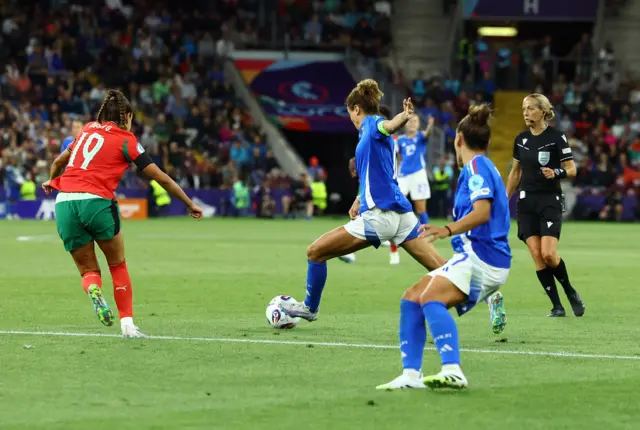 Italy's Cristiana Girelli scores their first goal