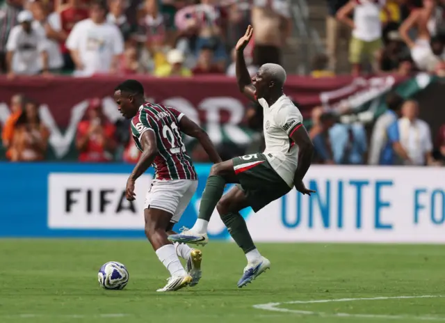 Moises Caicedo is challenged and suffers an ankle injury