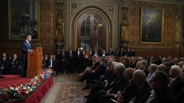 President of France Emmanuel Macron addresses MPs and peers in the Royal Gallery at the Palace of Westminster, central London, on day one of the French President's state visit to the UK