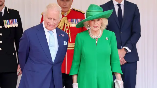 The King and Queen - the Queen wearing all green