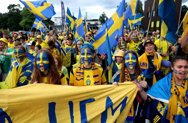 Sweden fans march to the ground in Lucerne