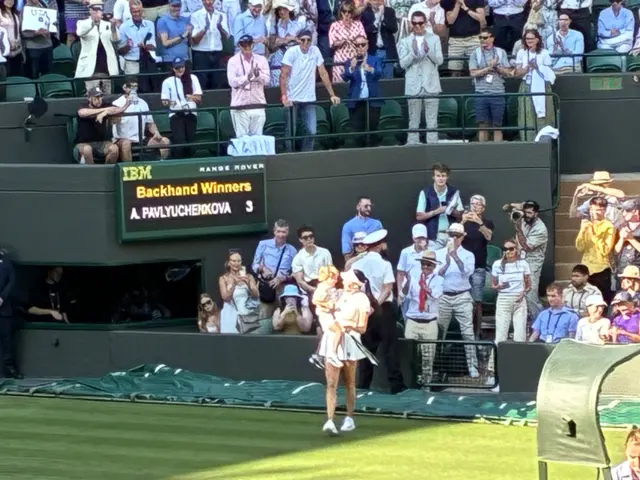 Anisimova carries her nephew