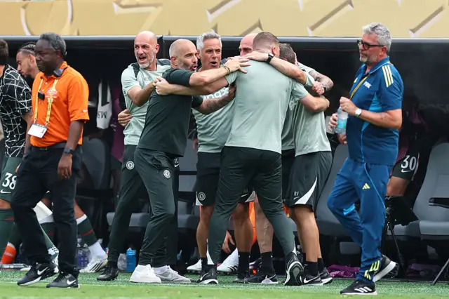 Chelsea manager Enzo Maresca celebrates with his staff after the victory over Fluminense