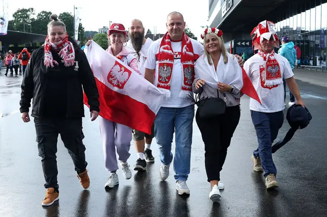 Poland fans arrive at the stadium