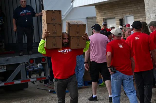 Volunteers at Gateway Fellowship Church receive donations of food, cleaning supplies and "Blessing Buckets"
