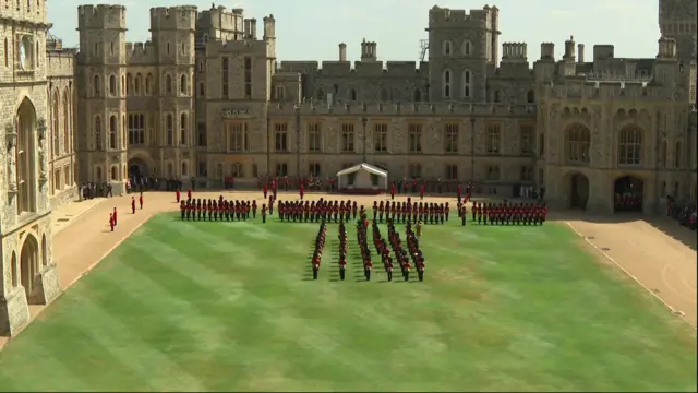 Soldiers inside a square in the middle of a castle