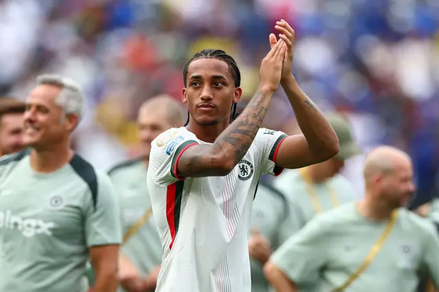 Joao Pedro applauds the fans