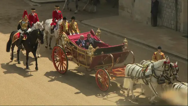 Carriage being driven inside grounds of Windsor