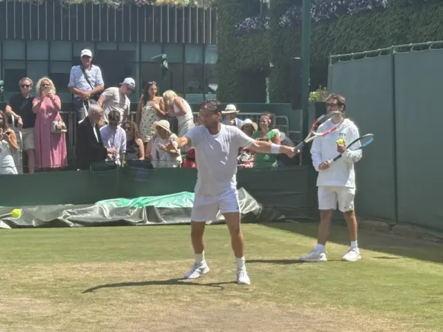 Can Norrie hitting at Wimbledon