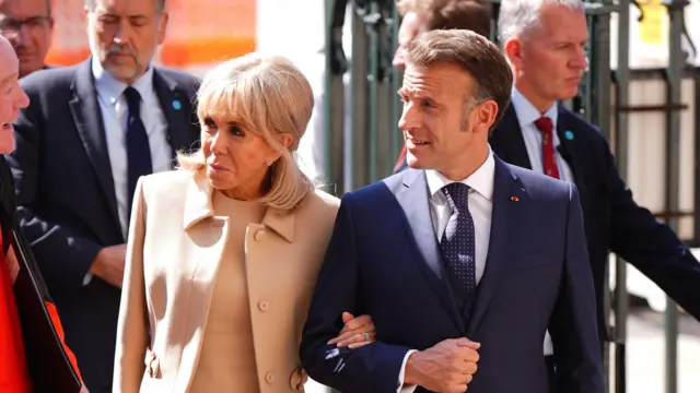 The President of France Emmanuel Macron and his wife Brigitte Macron arrive for a visit to Westminster Abbey, central London, on day one of the French President's state visit to the UK.