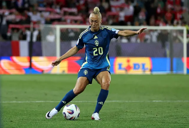 Hanna Bennison of Sweden passes the ball